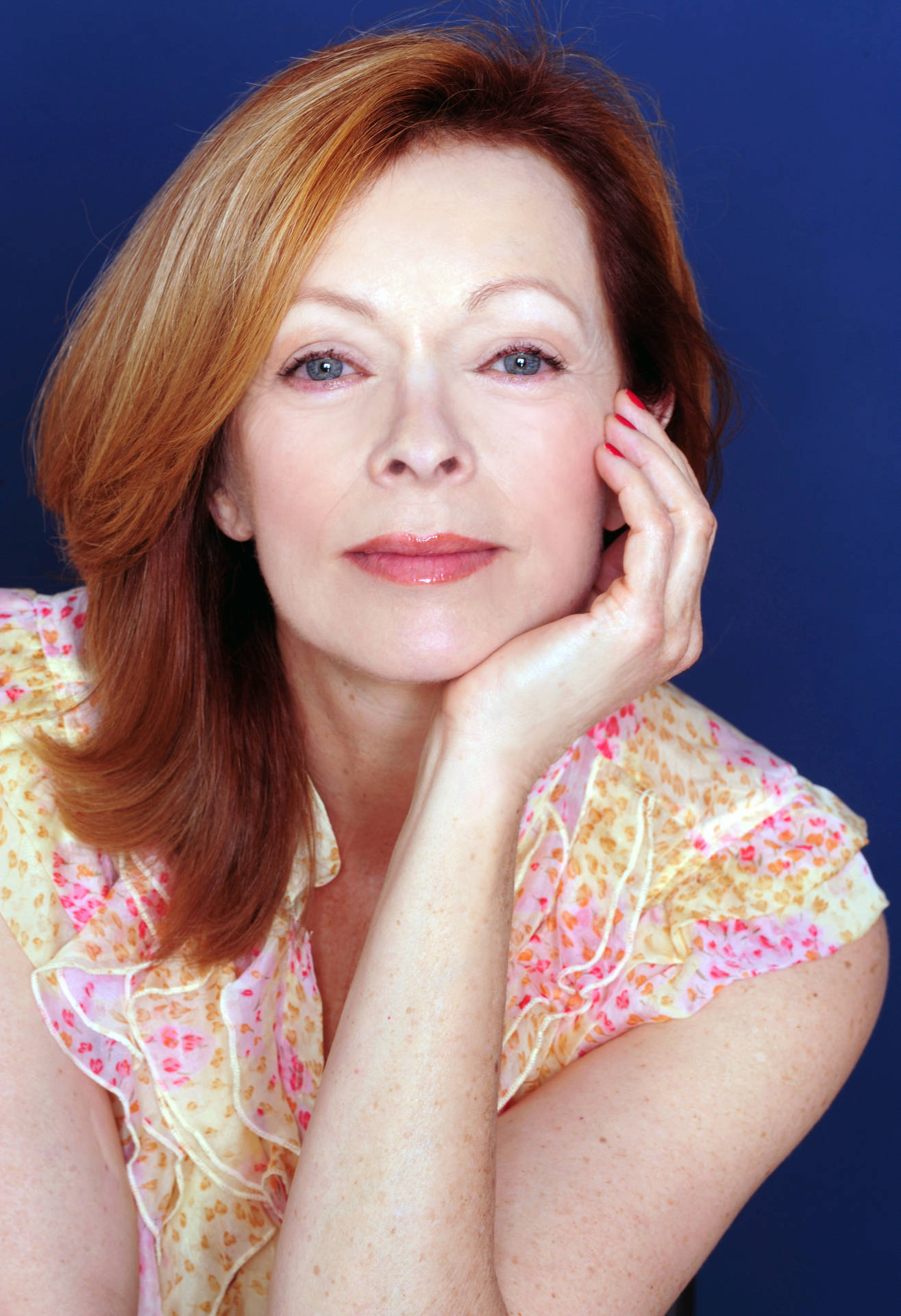 Frances Fisher On Purple Background