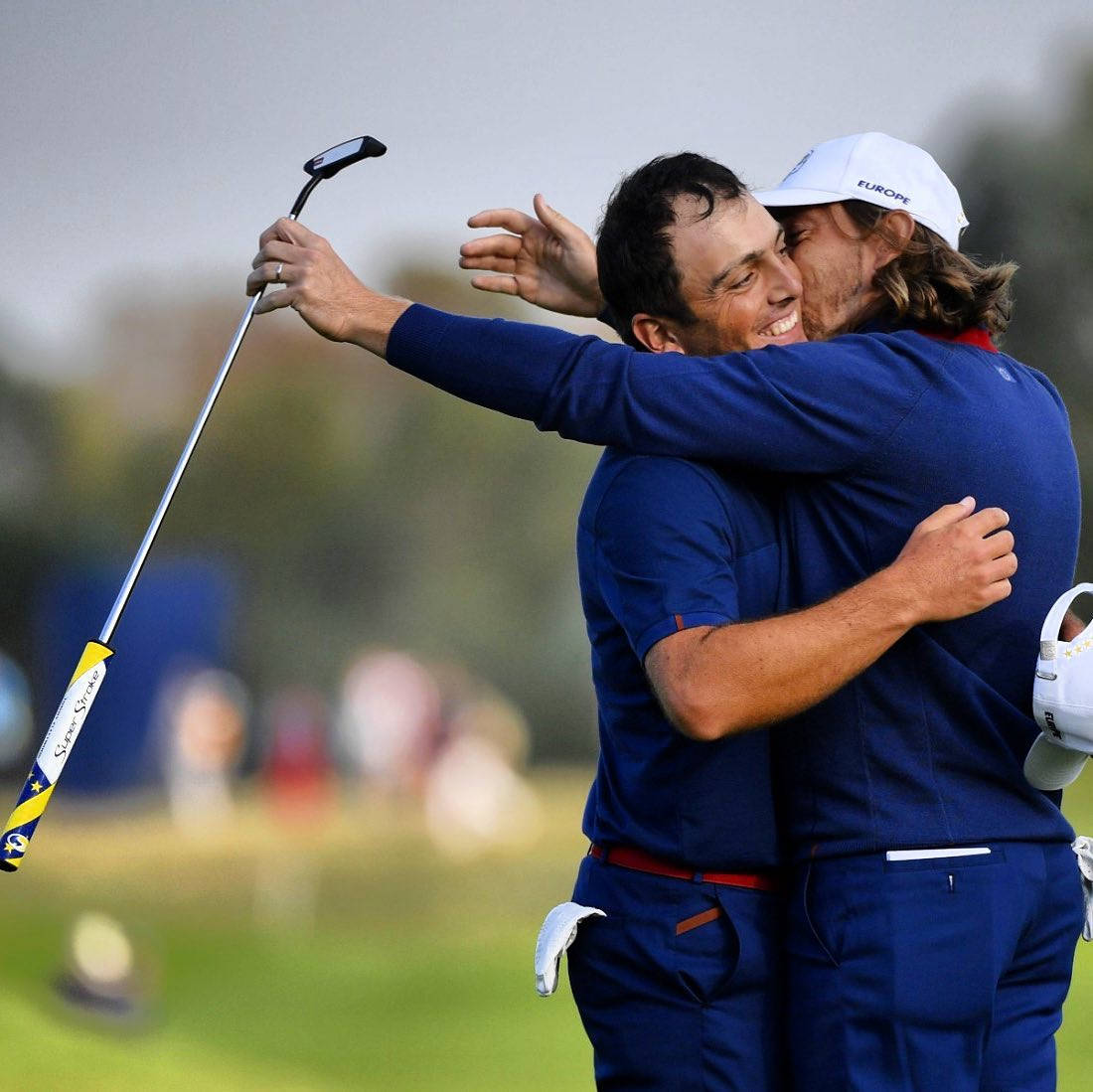 Francesco Molinari Hugging Opponent Background