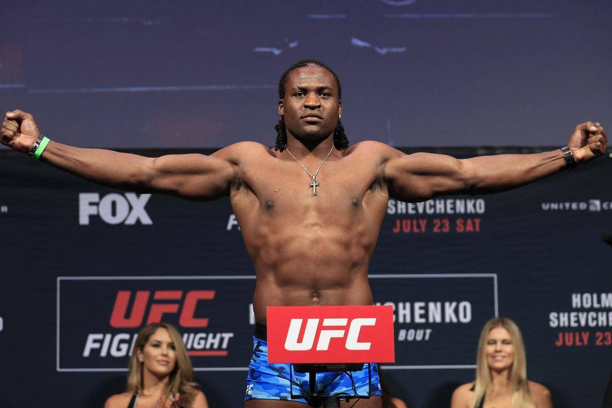 Francis Ngannou Arms Spread Background