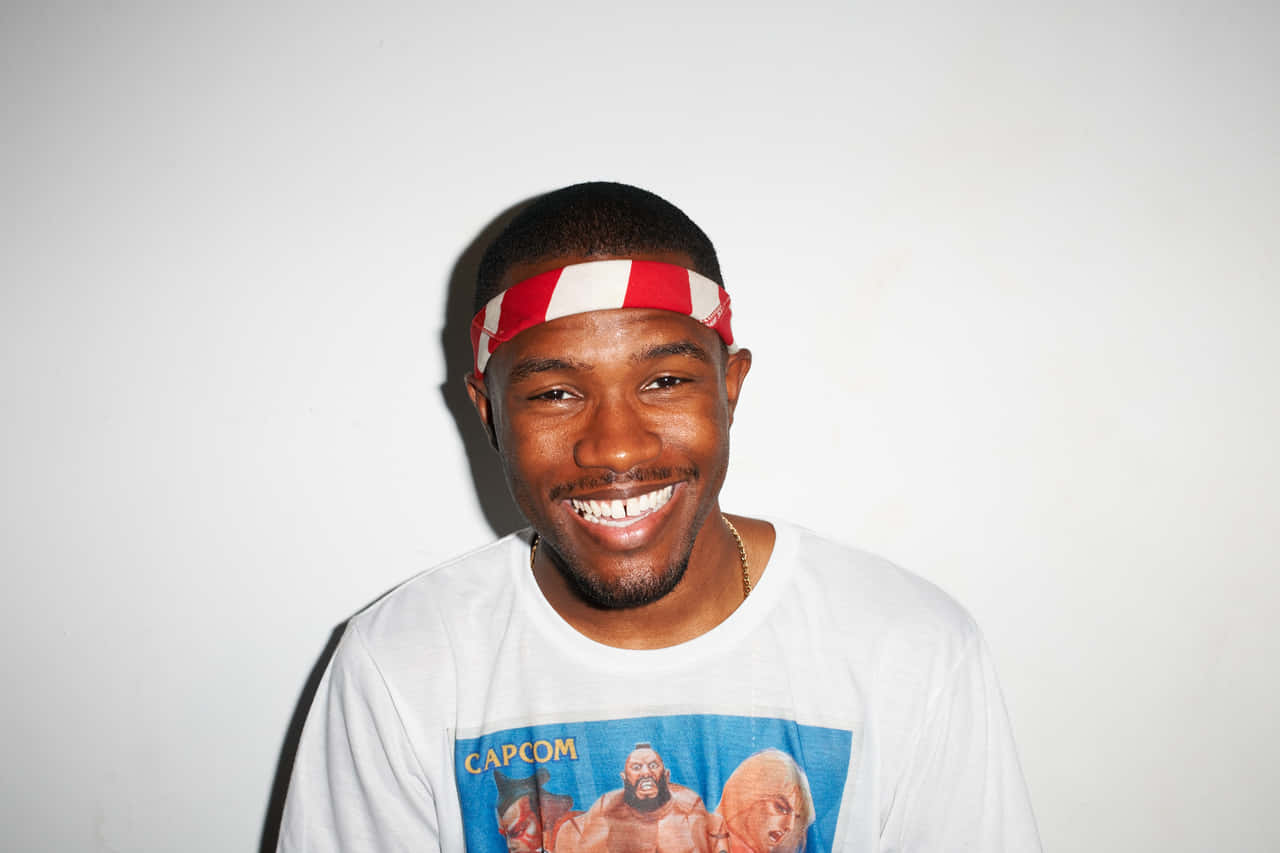 Frank Ocean Enjoying His Laptop Background