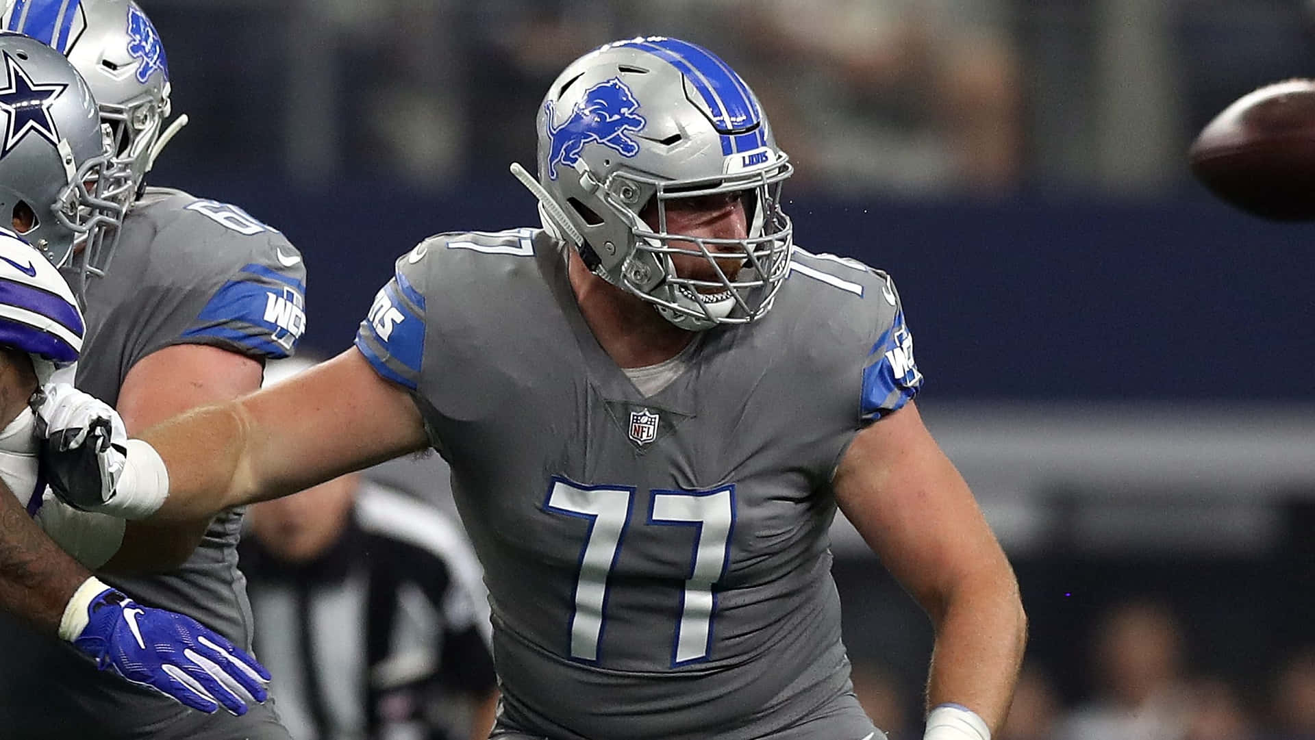 Frank Ragnow Wearing Grey Detroit Lions Jersey Background
