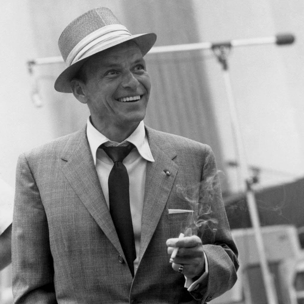 Frank Sinatra Holding A Cigarette Background