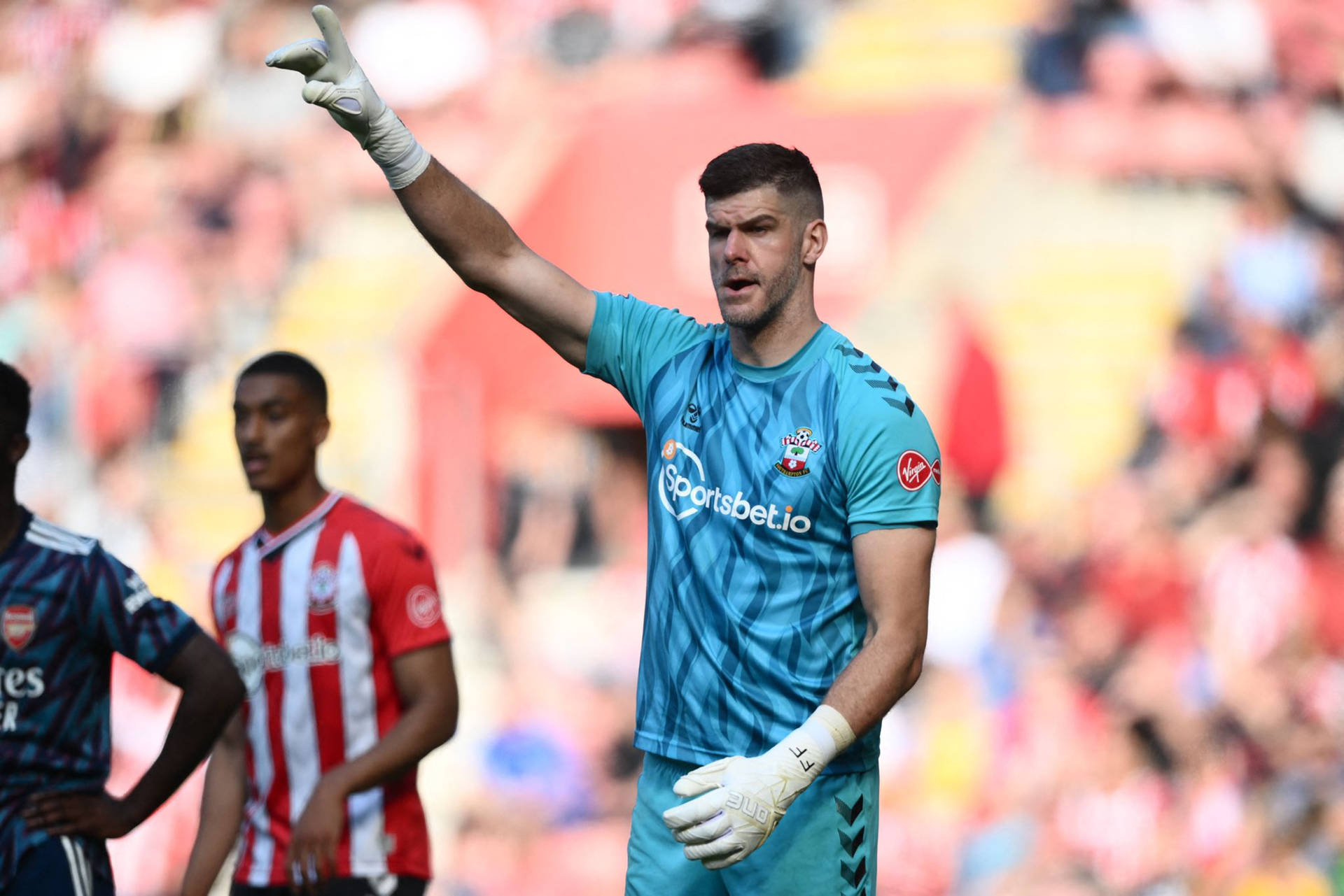 Fraser Forster Doing Hand Sign Background