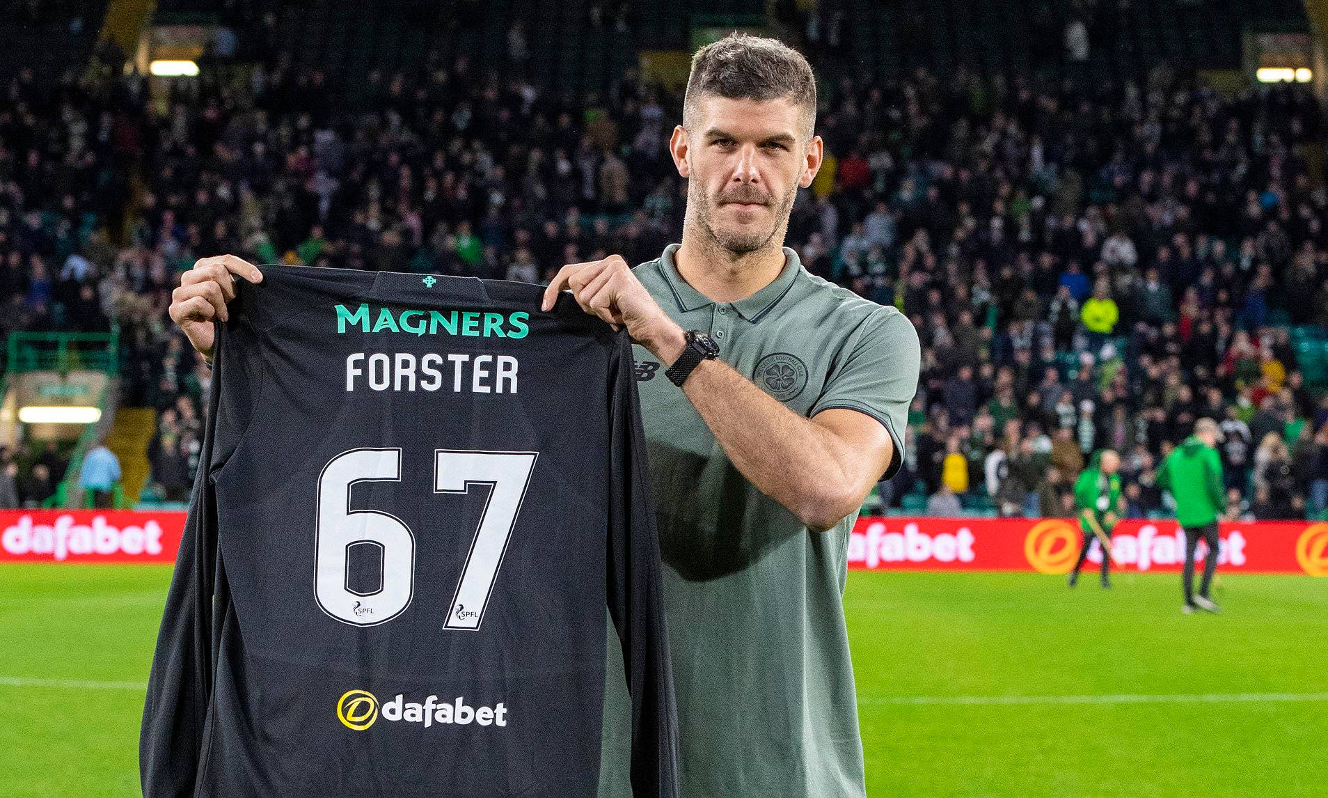 Fraser Forster Holding Black Sweater Background