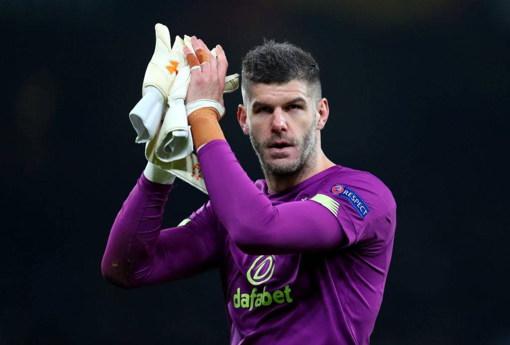 Fraser Forster Holding His Gloves Background