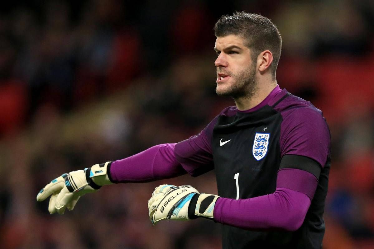 Fraser Forster Pointing To His Right Background