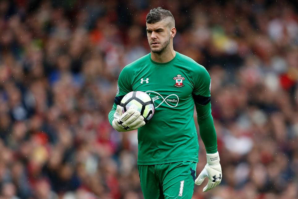 Fraser Forster Walking With A Ball Background