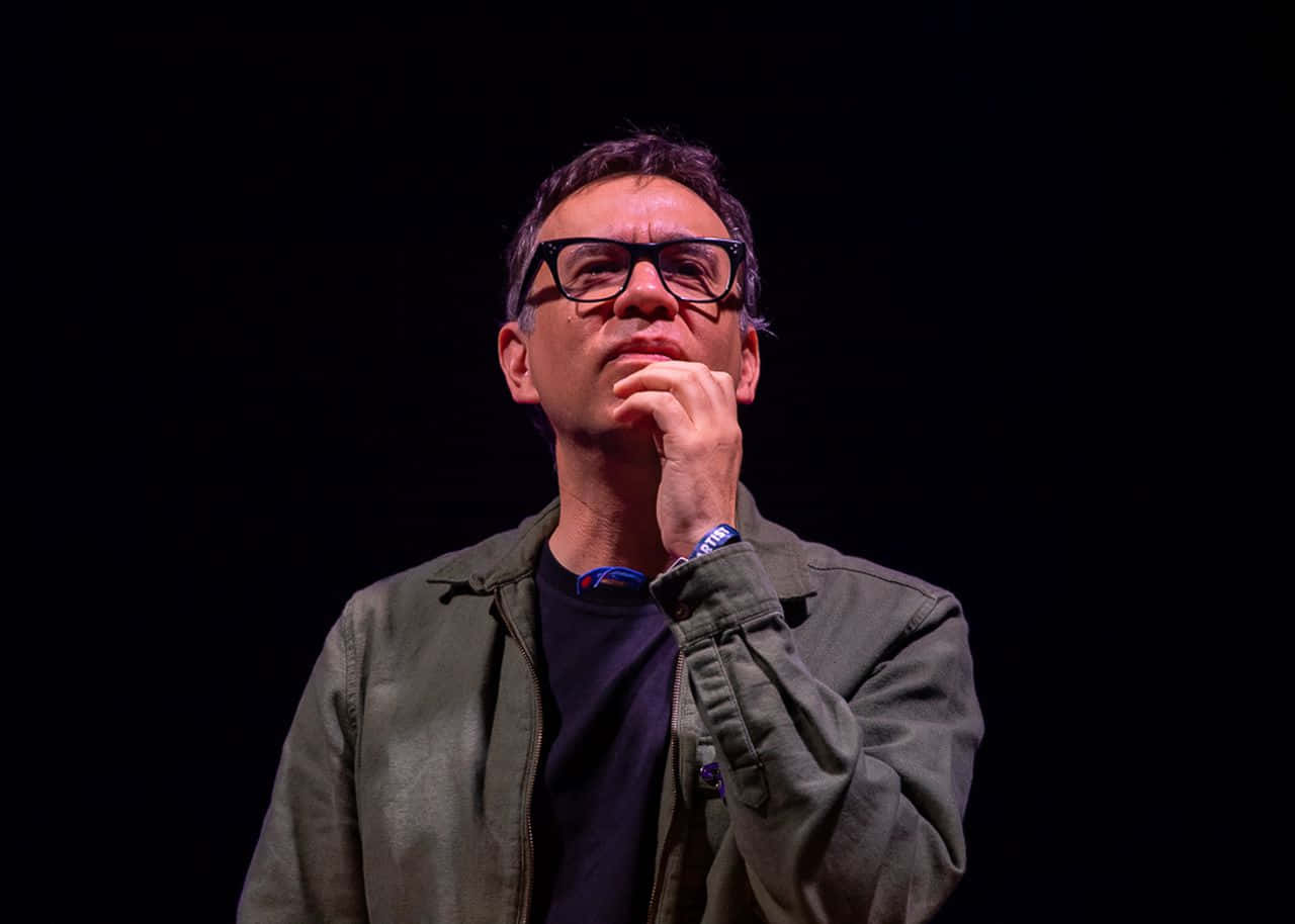 Fred Armisen Takes A Break In The Middle Of A Production. Background