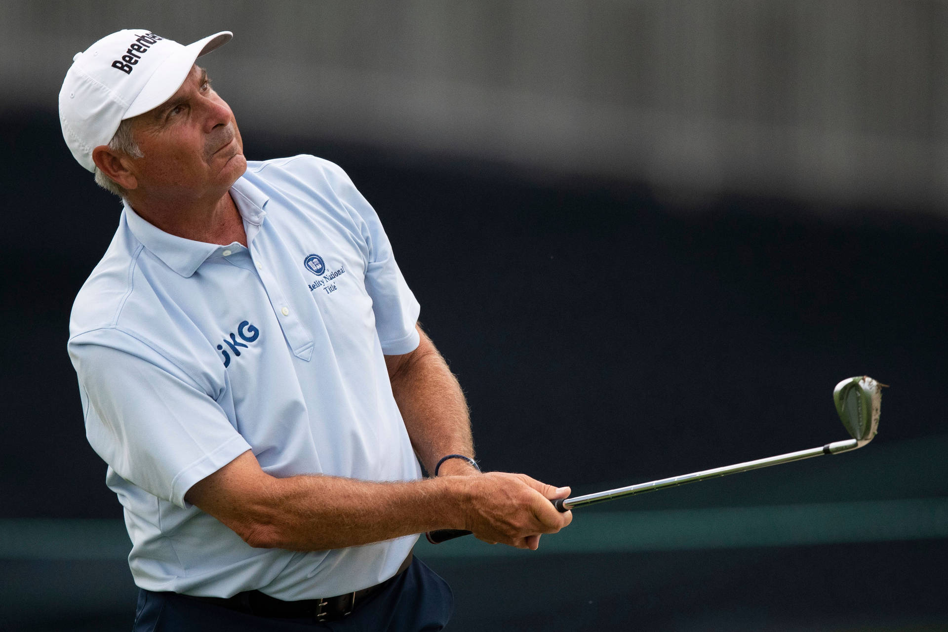 Fred Couples Holding Golf Club Background