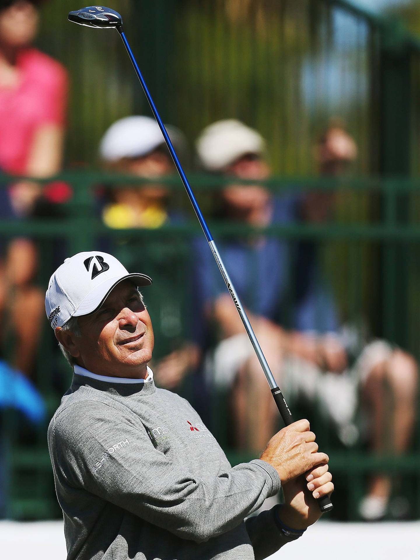 Fred Couples Holding Golf Club Background