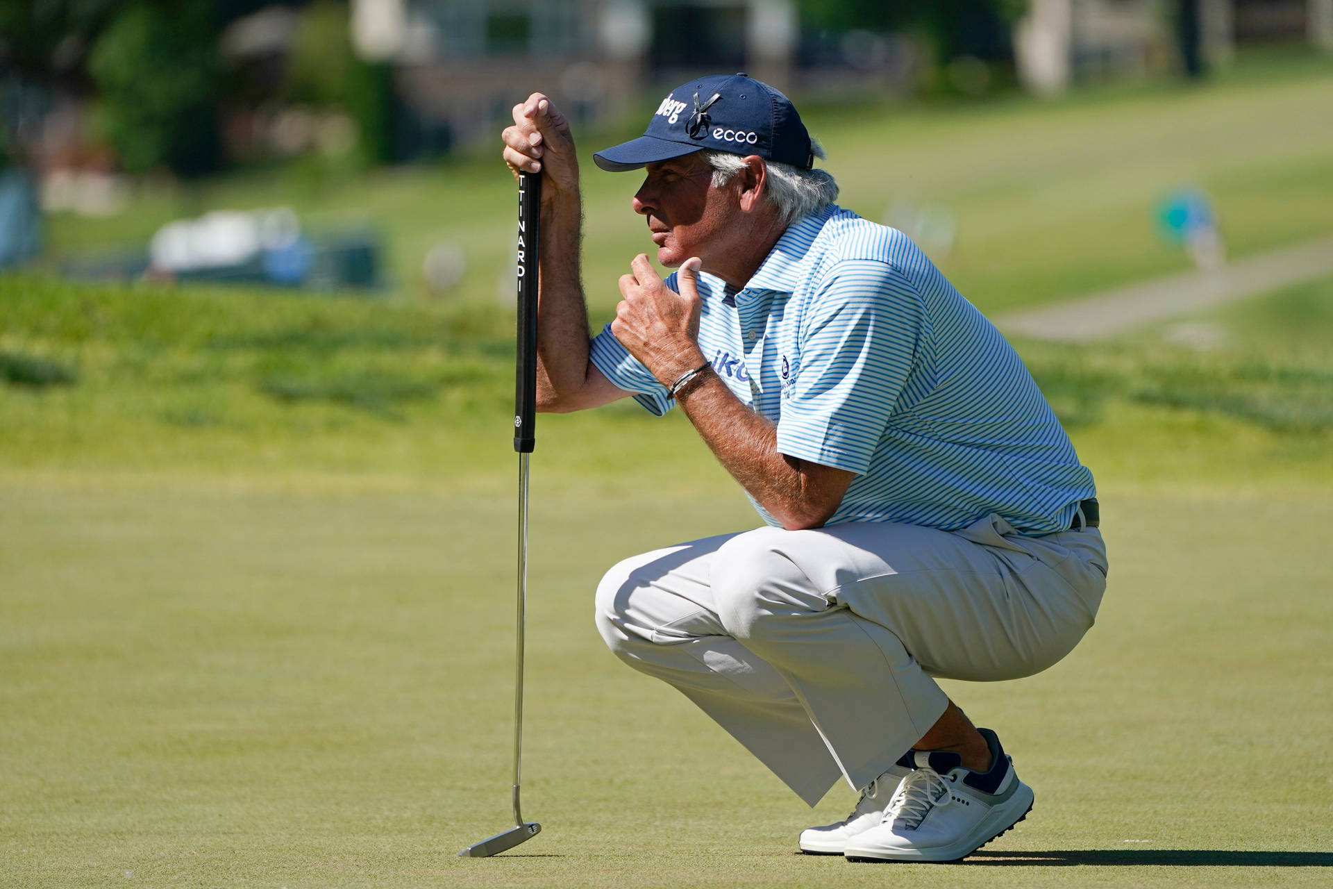 Fred Couples On A Golf Course Background