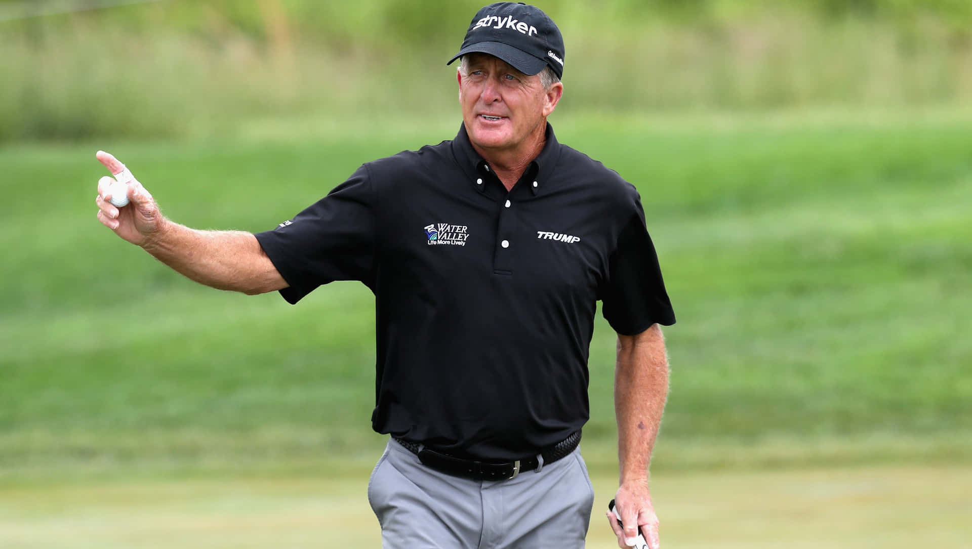 Fred Funk Holding Golf Ball Background