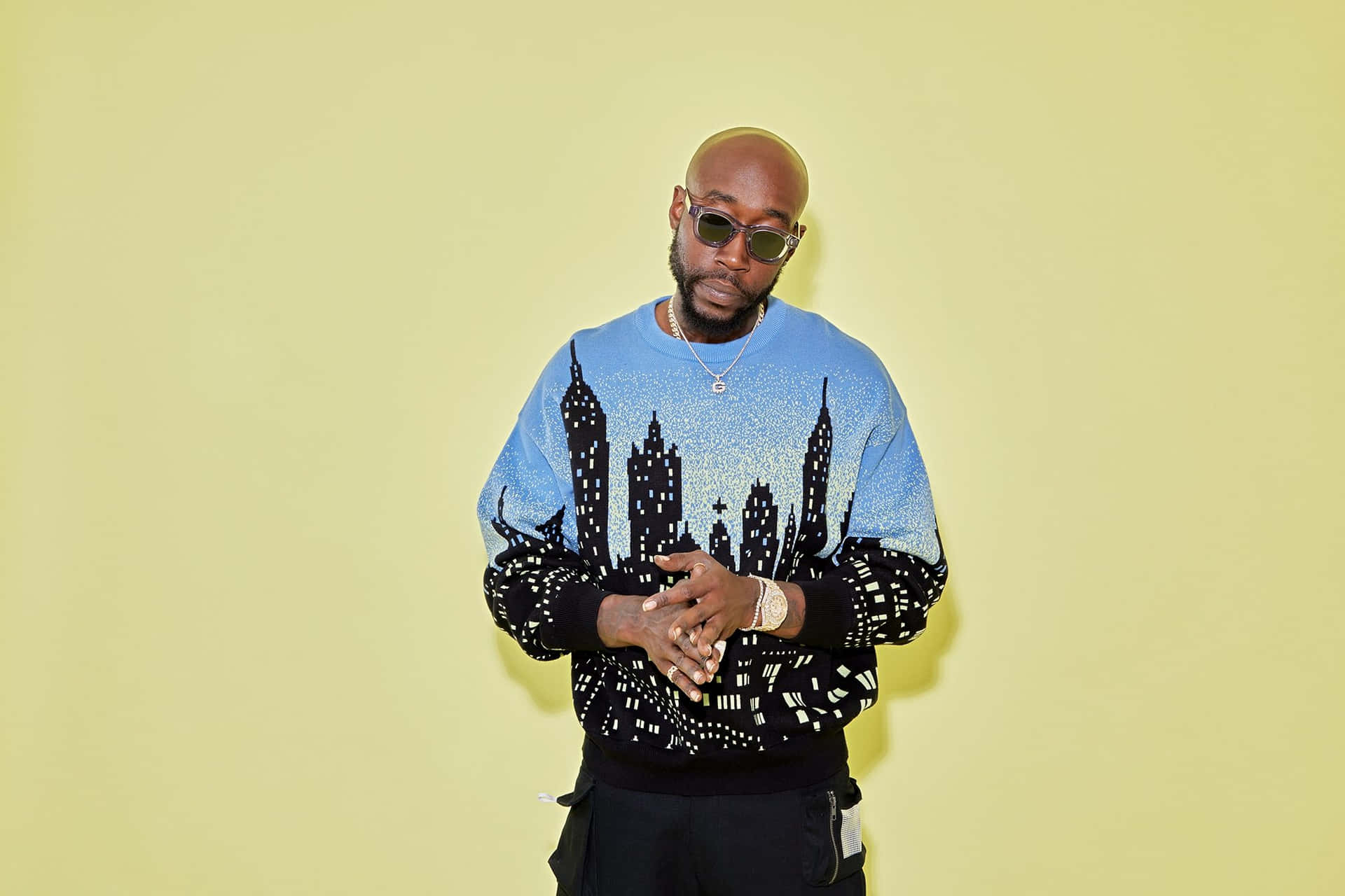 Freddie Gibbs Yellow Backdrop Background