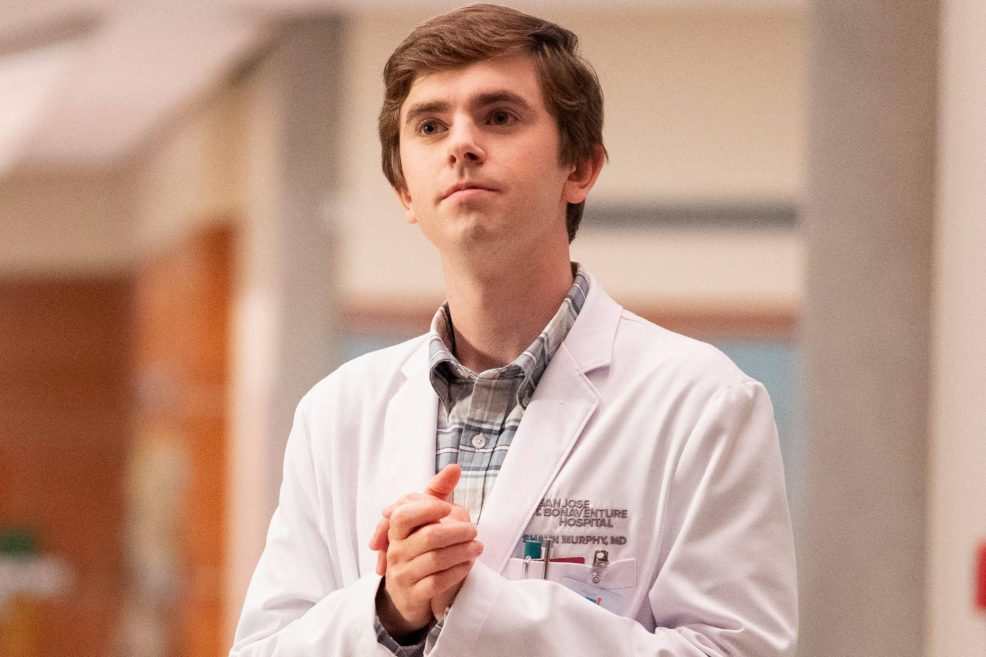 Freddie Highmore In Doctor Suit Background