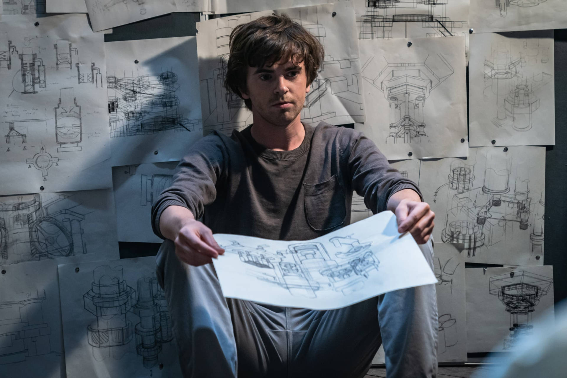 Freddie Highmore With Drawings Background