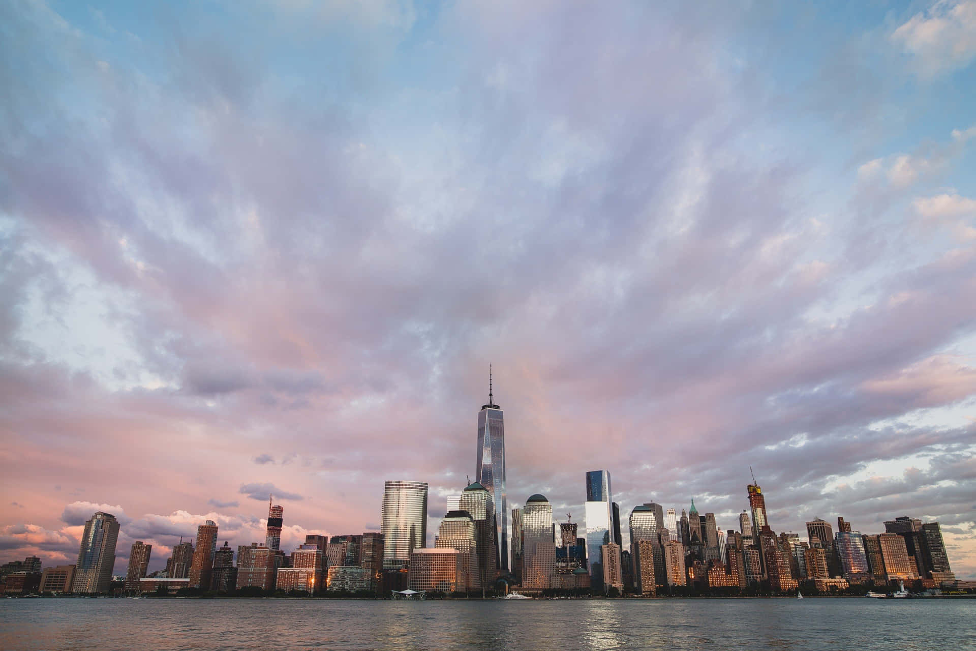 Freedom Tower New York Skyline Under Purple Clouds Background