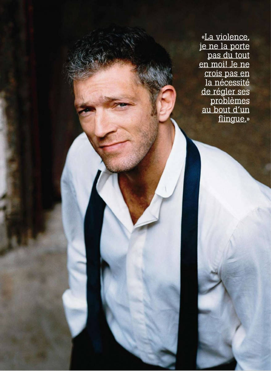 French Actor Vincent Cassel In A Stylish Jumpsuit Background