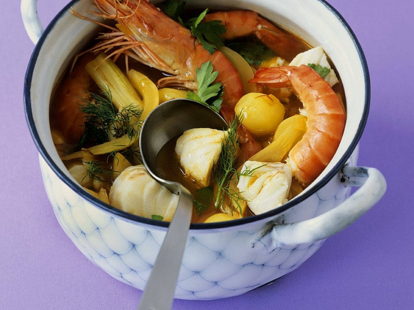 French Bouillabaisse On Decorated Casserole Background