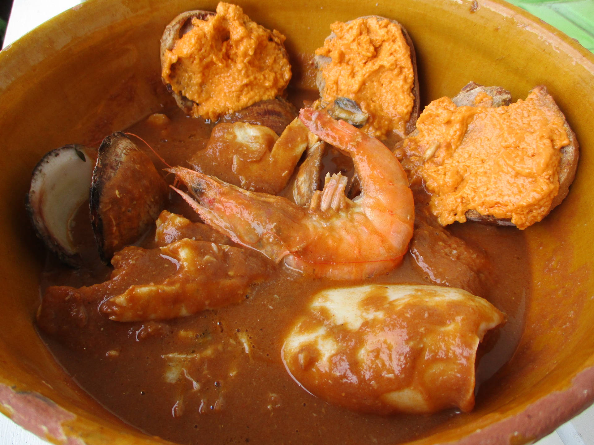 French Bouillabaisse Recipe In Brown Bowl Background