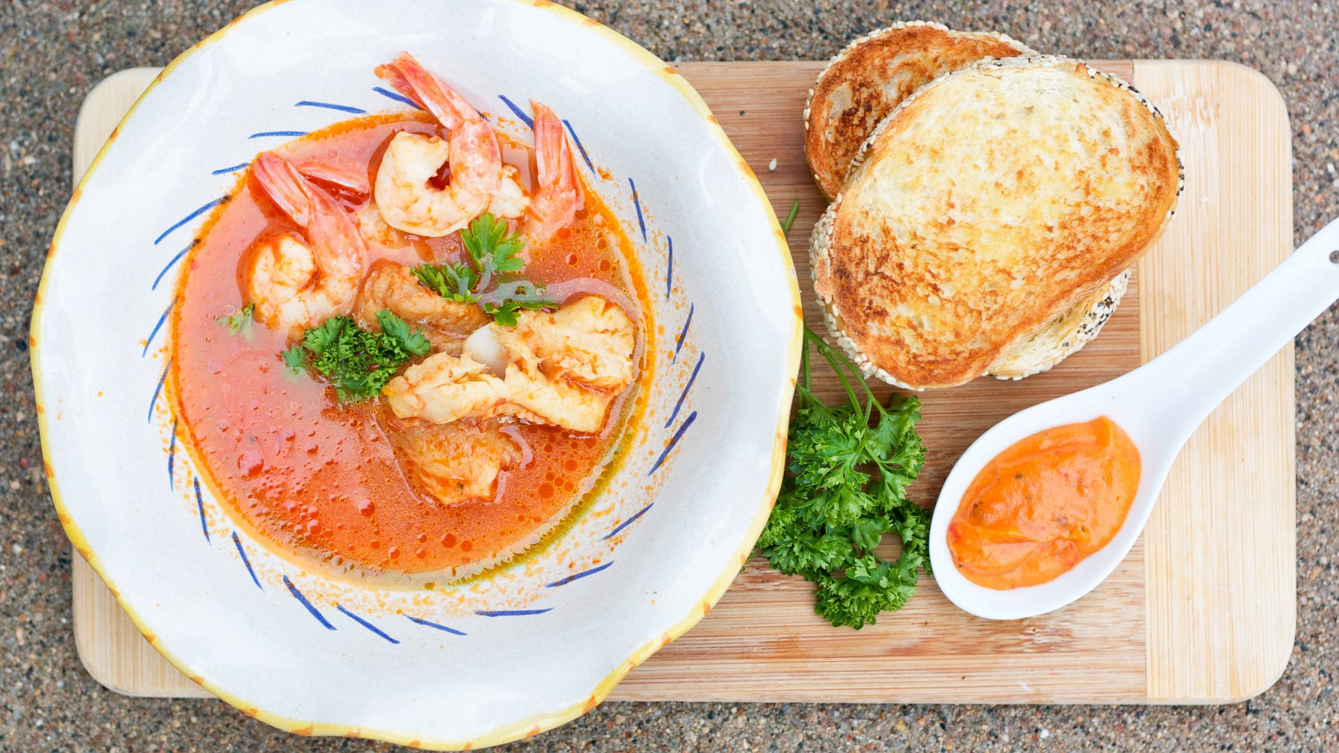 French Bouillabaisse Seafood Dish On Wooden Board Background