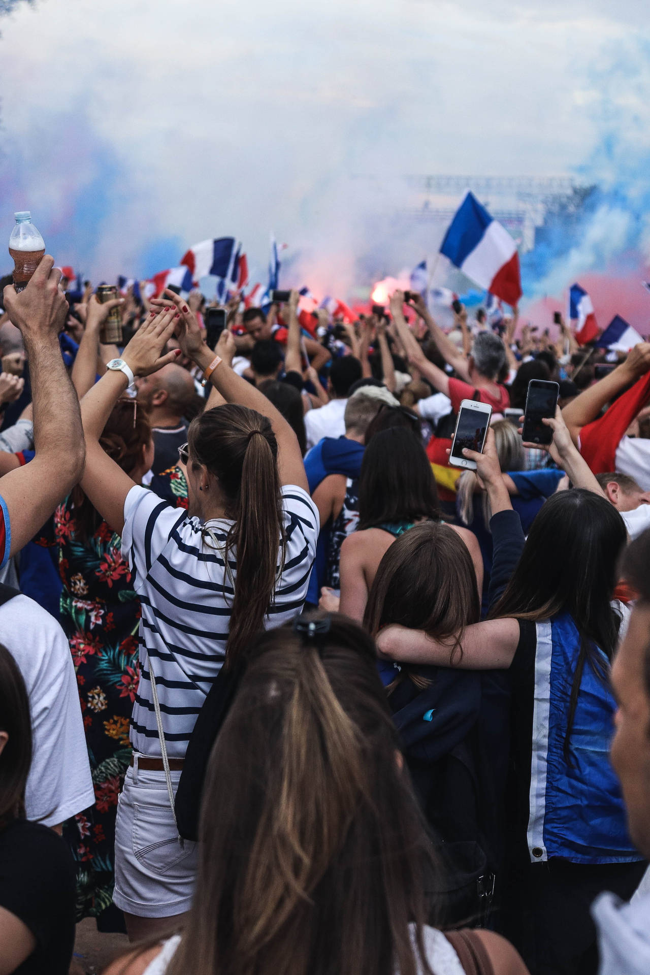 French Fans Proudly Show Their National Pride During The World Cup. Background