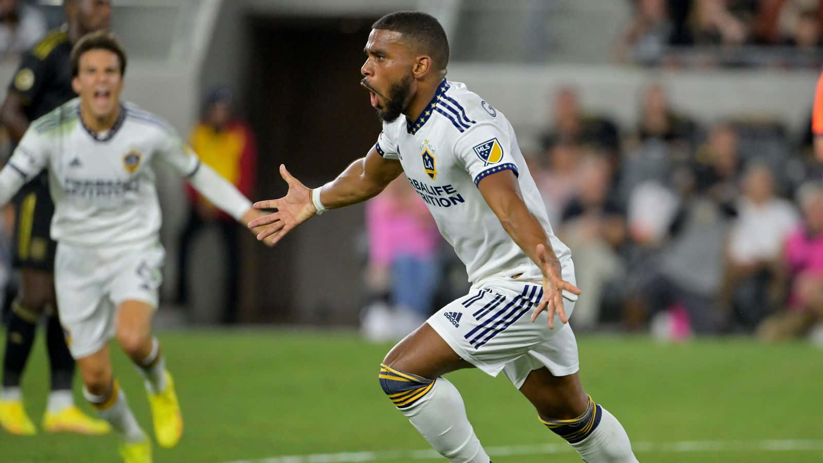 French La Galaxy Player Samuel Grandsir Medium Wide Shot Background