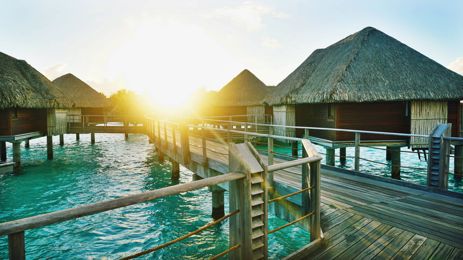 French Polynesia Houses On Sea Background