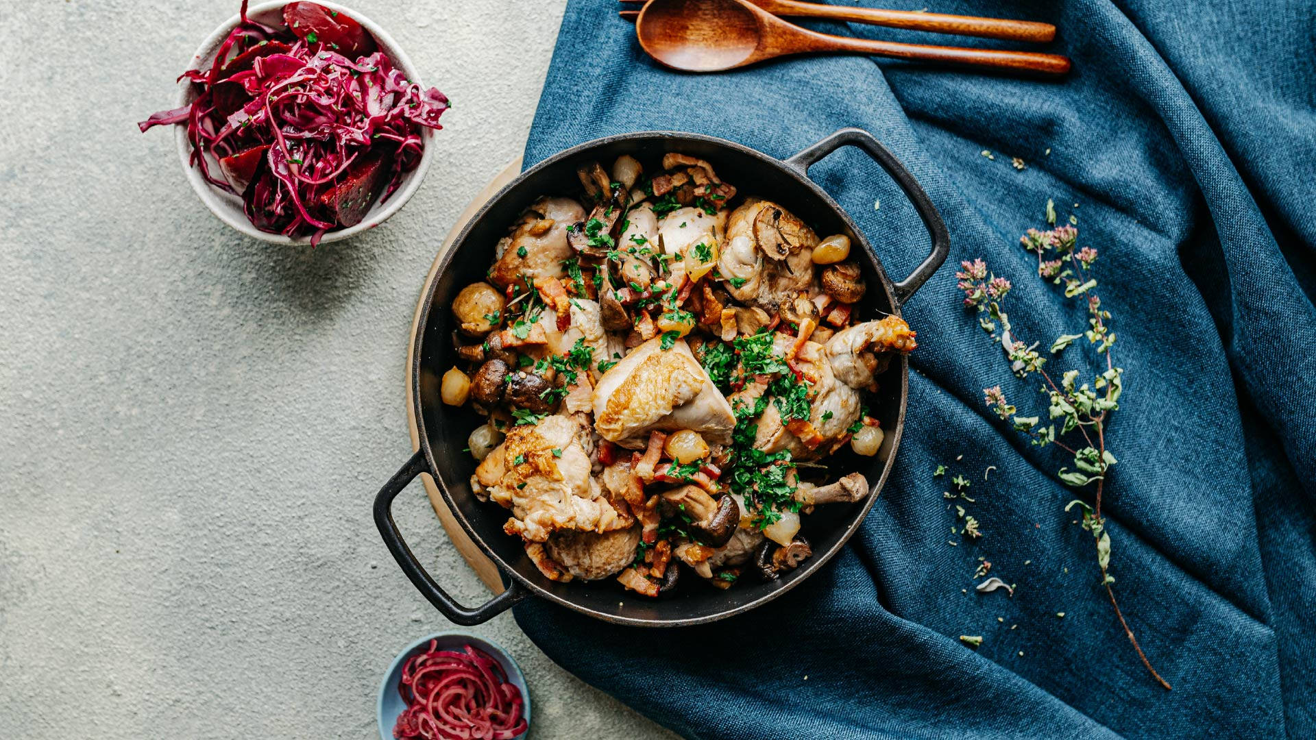 French Stew Coq Au Vin And Shredded Purple Cabbage Background