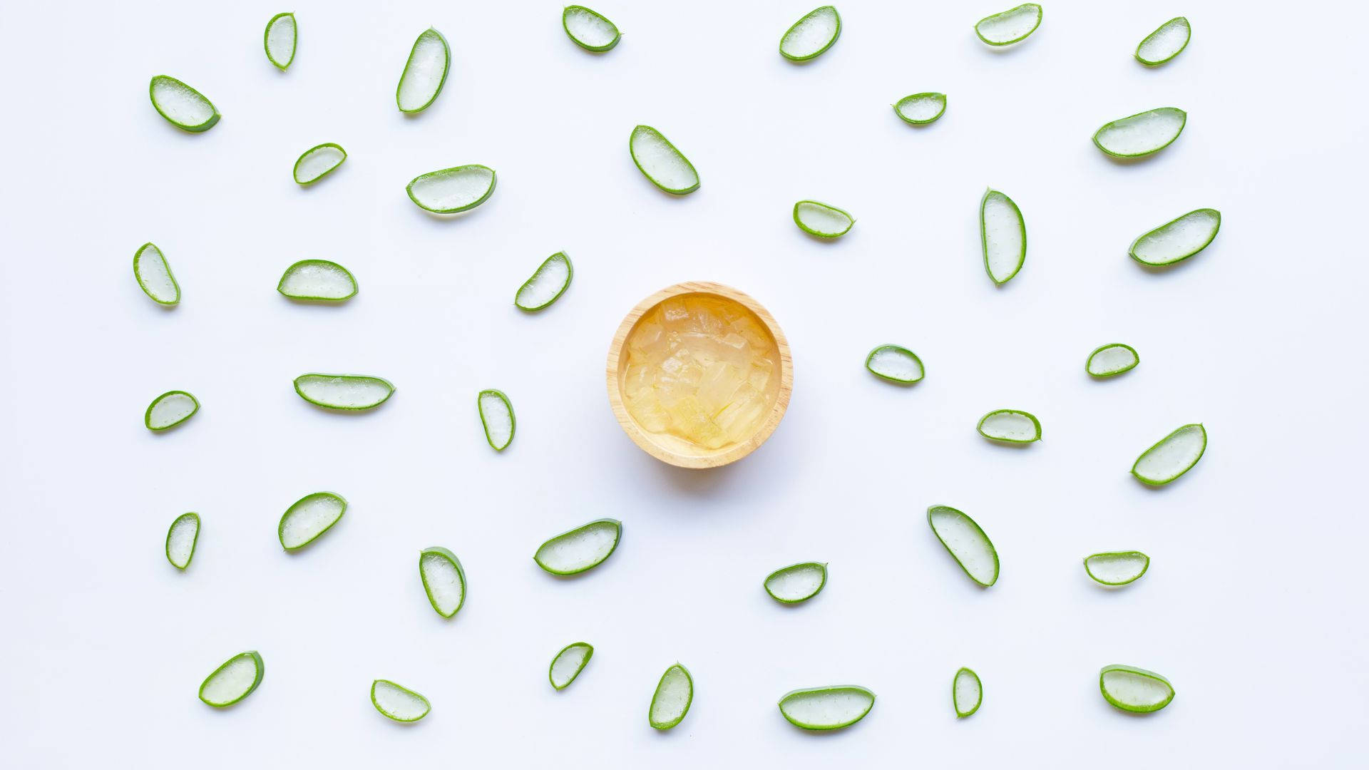 Fresh Aloe Vera Slices Showcasing The Inner Gel Background