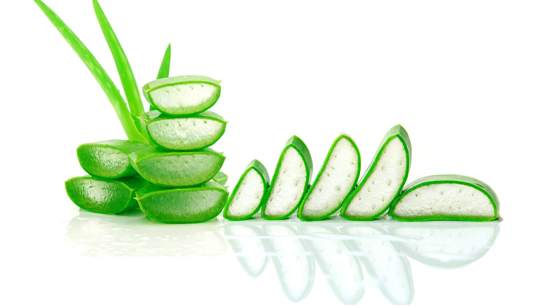 Fresh Aloe Vera Slices Stacked Neatly Background