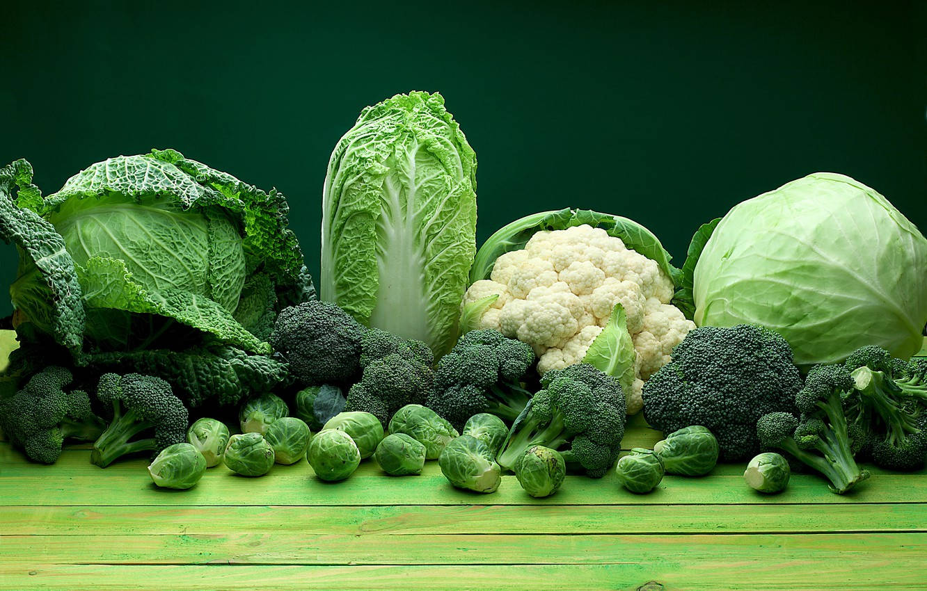 Fresh And Healthy Green Broccoli And Leafy Vegetables Background