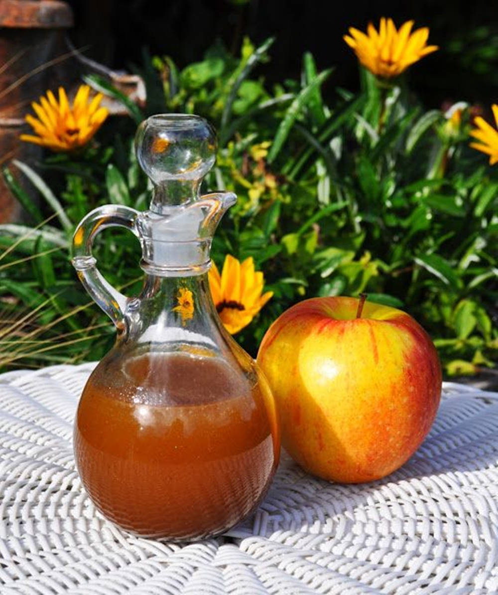 Fresh And Natural Apple Cider Vinegar Background