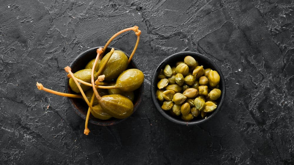 Fresh And Tasty Capers In A Bowl Background