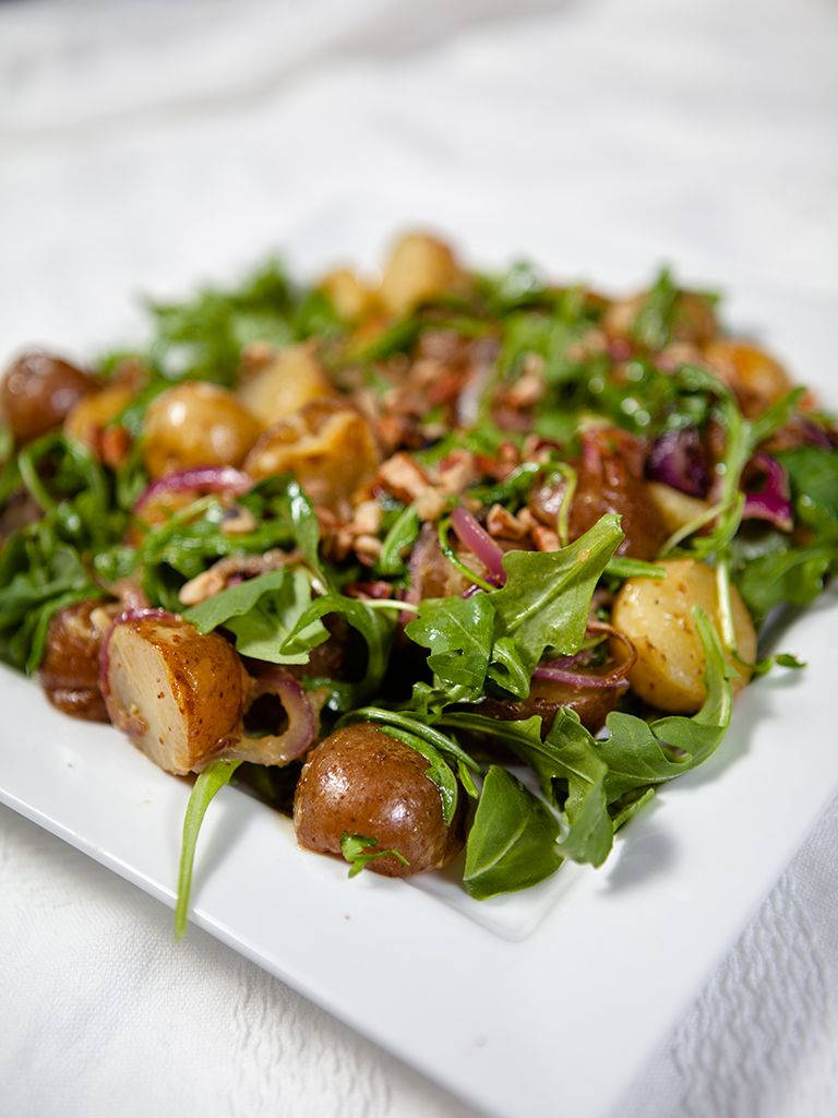 Fresh Arugula Leaves And Potato Salad