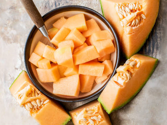 Fresh Cantaloupe In A Ceramic Bowl