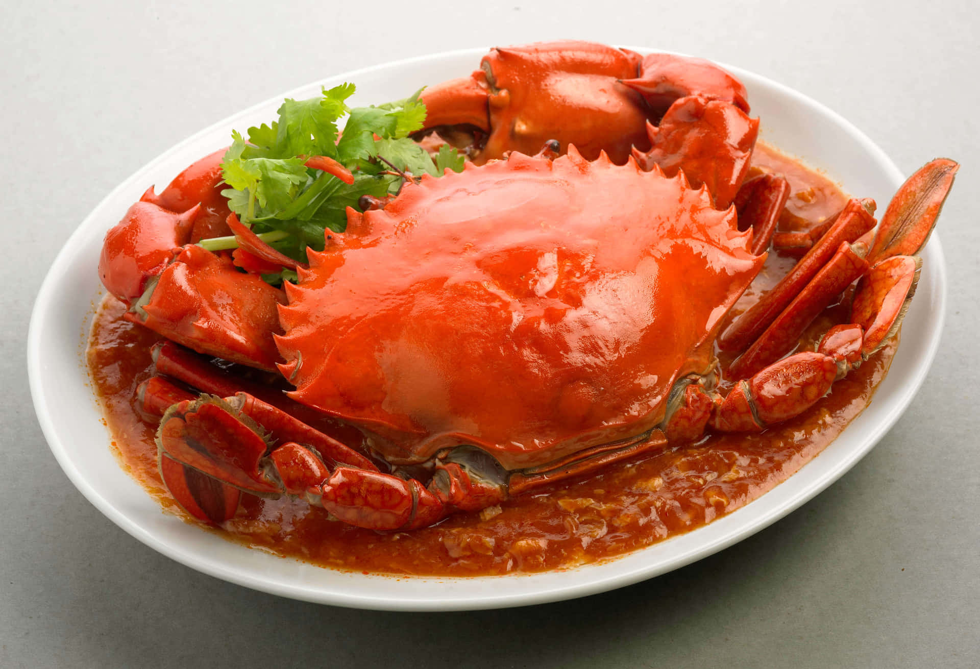 Fresh Chilli Crab On White Platter Background