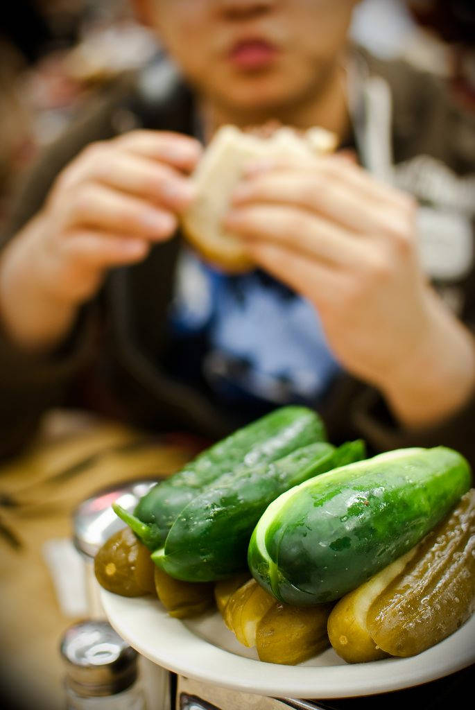 Fresh Cucumbers And Pickles Arrangement Background