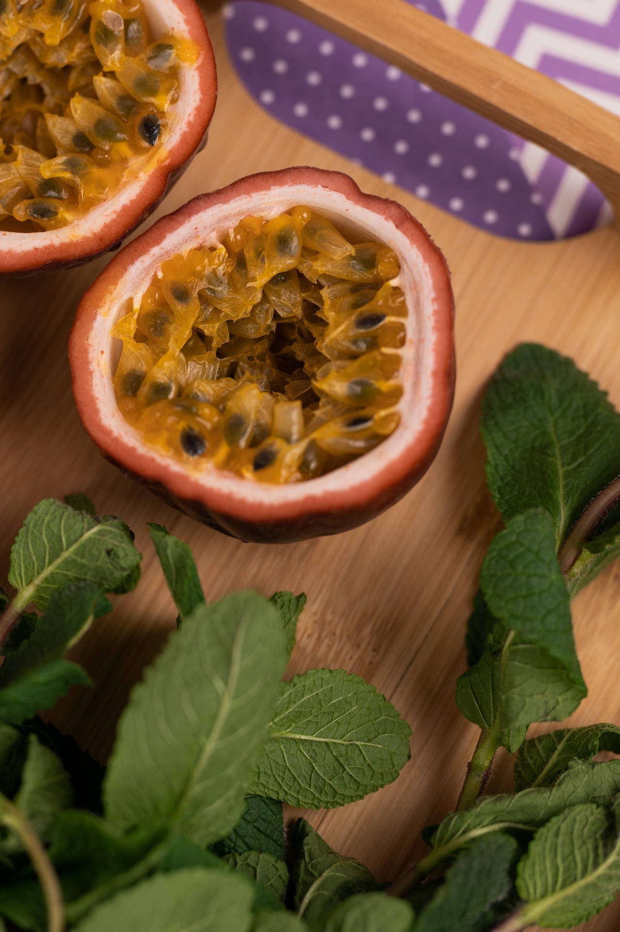 Fresh Cut Passion Fruit With Leaves Background