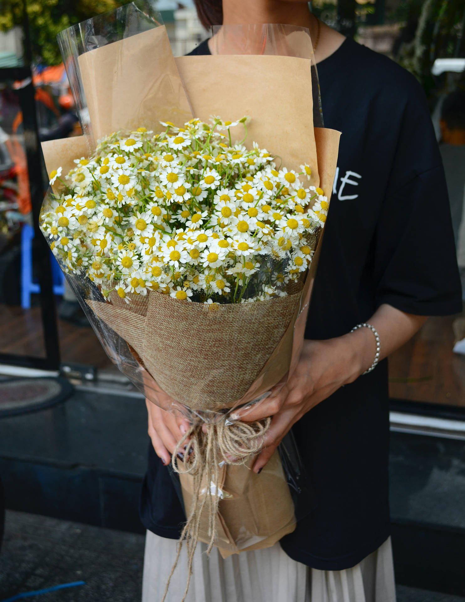 Fresh Feverfew Flower Bouquet At Flower Shop Background