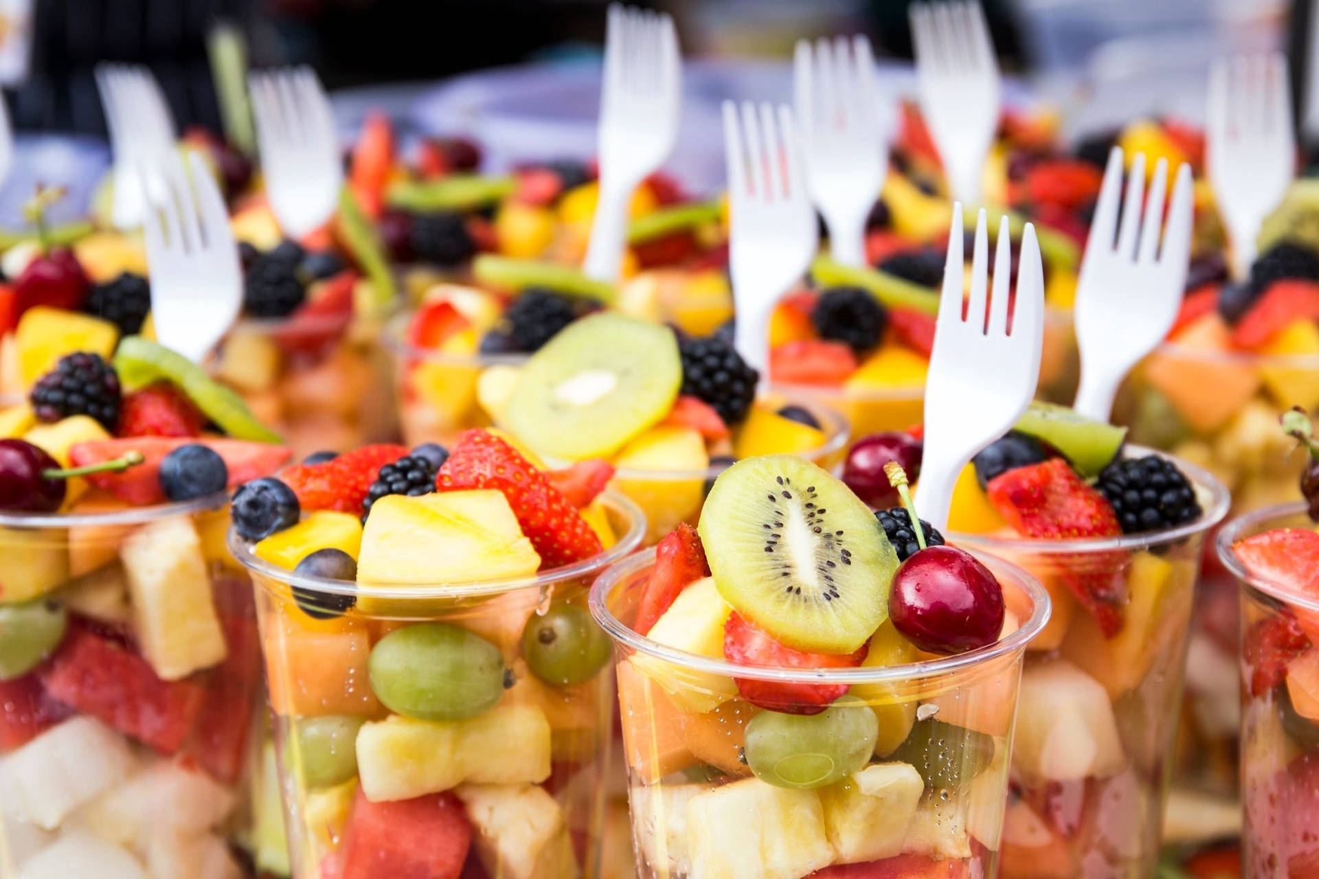 Fresh Fruit Salad In Cups Background