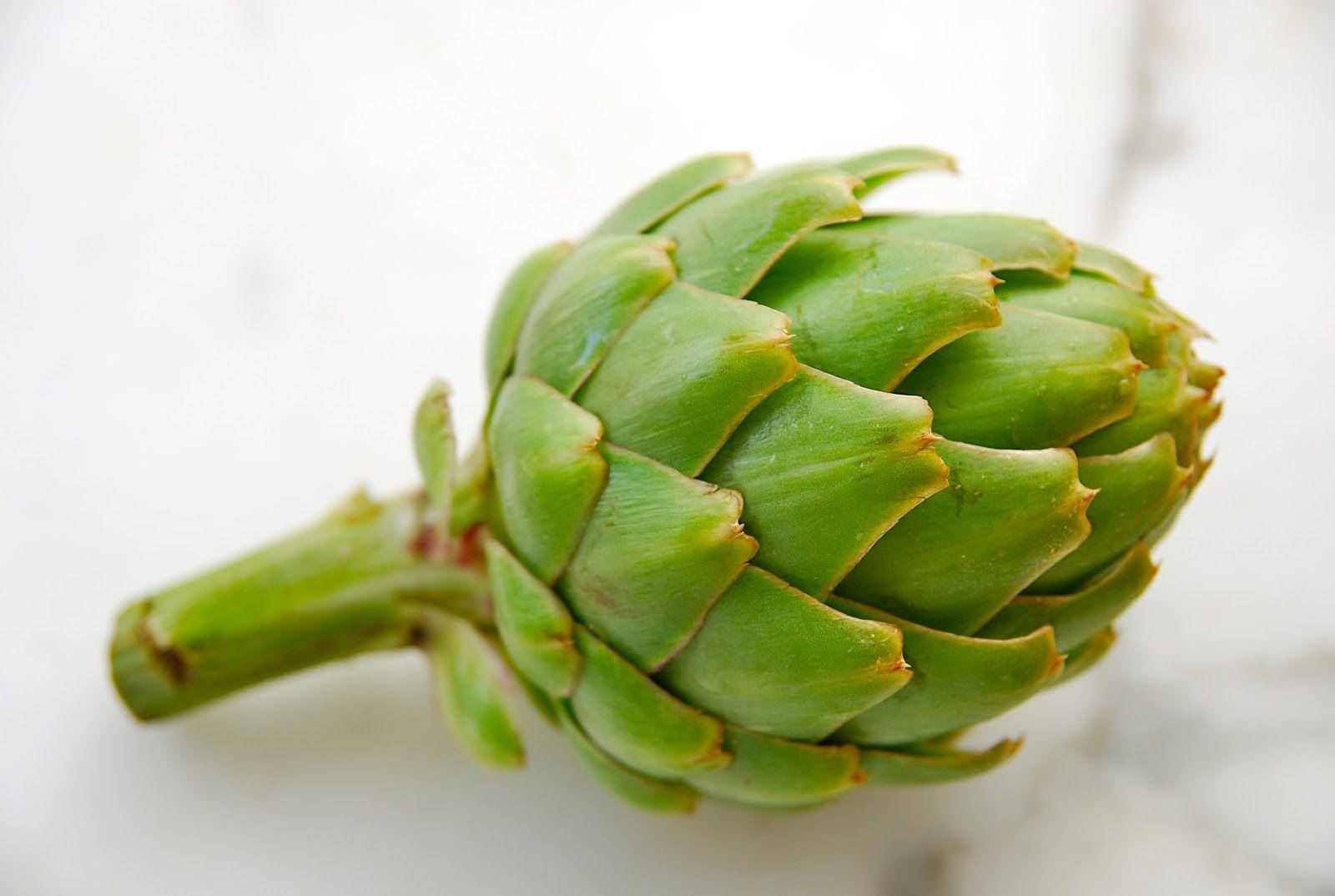 Fresh Green Artichoke In Natural Environment Background