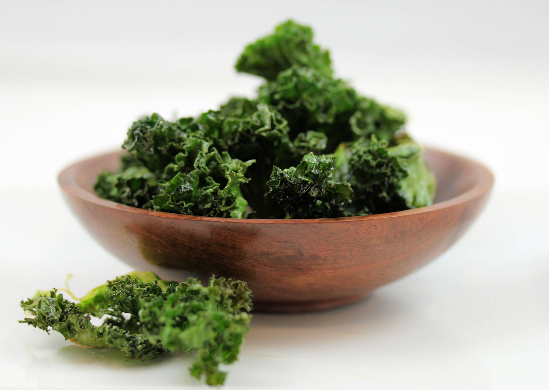 Fresh Green Kale Leaves On White Background Background