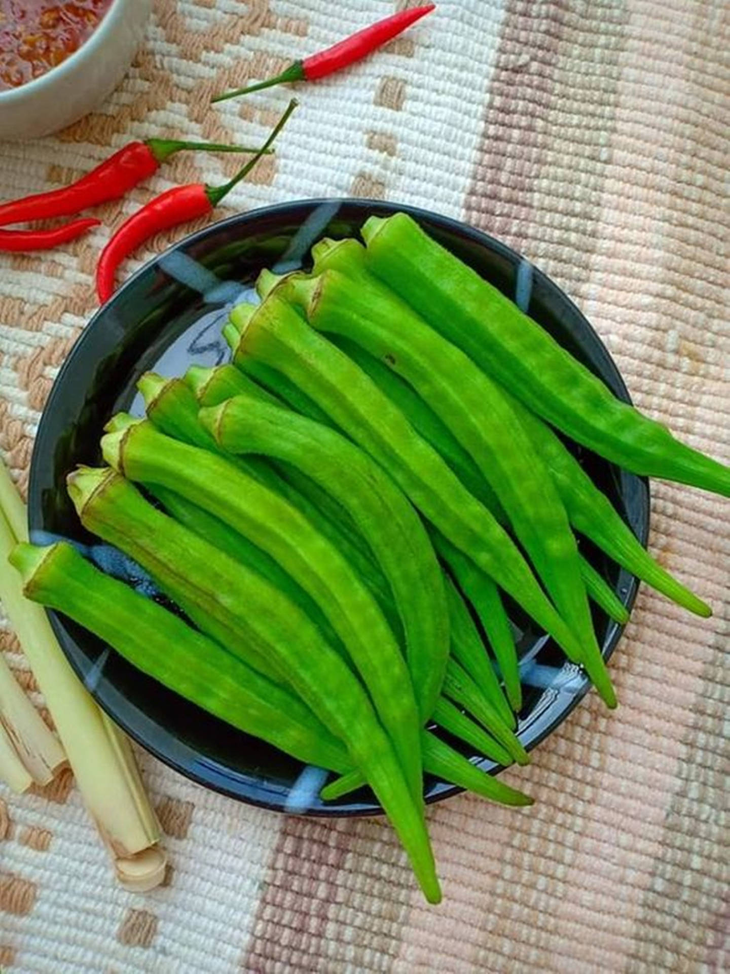 Fresh Green Okra Vegetables On A Black Plate Background