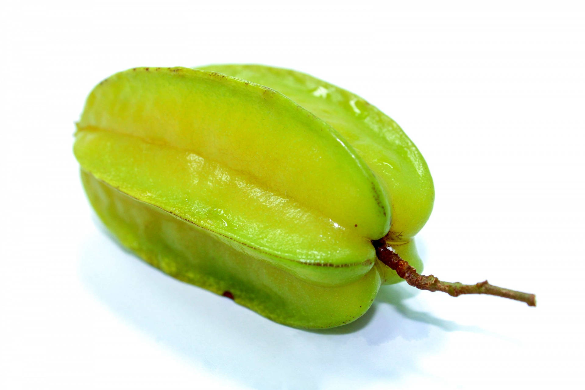 Fresh Green Star Fruit On White Background Background