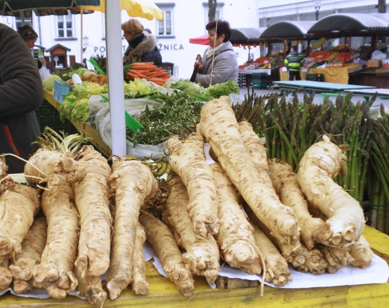 Fresh Horseradish On Market Stall