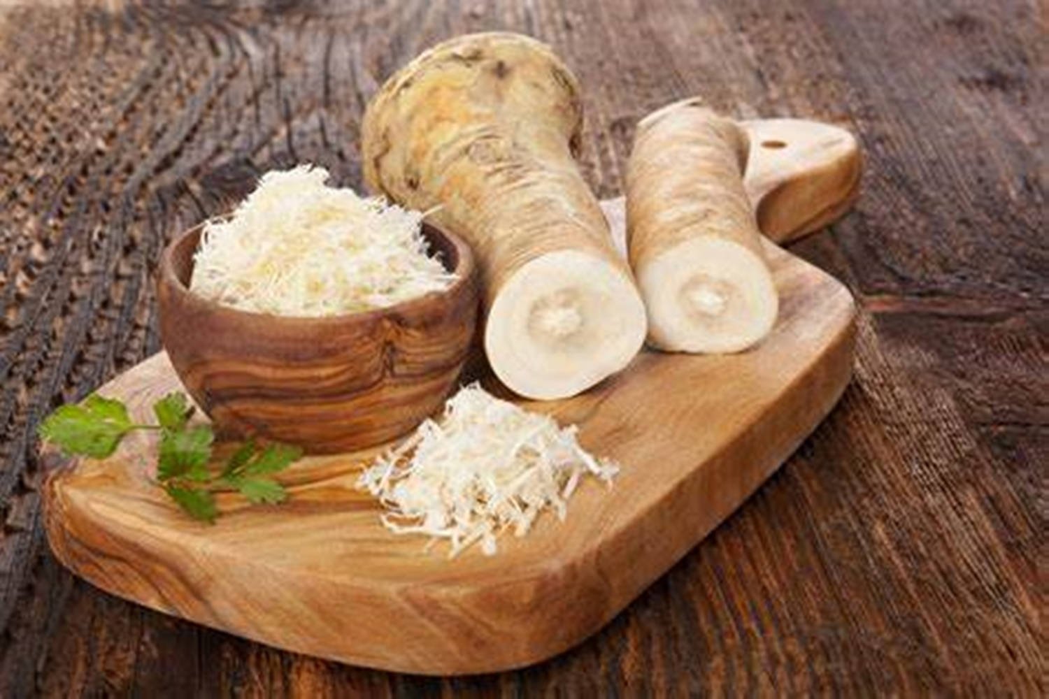 Fresh Horseradish Root On Wooden Cutting Board Background