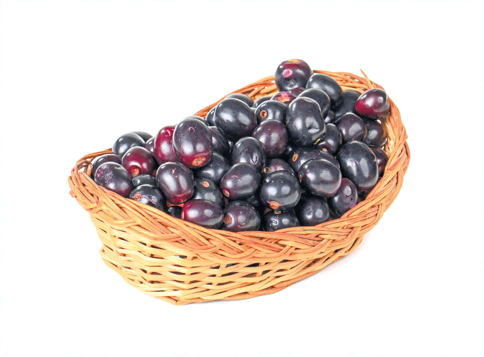 Fresh Java Plums In A Weaved Basket Background