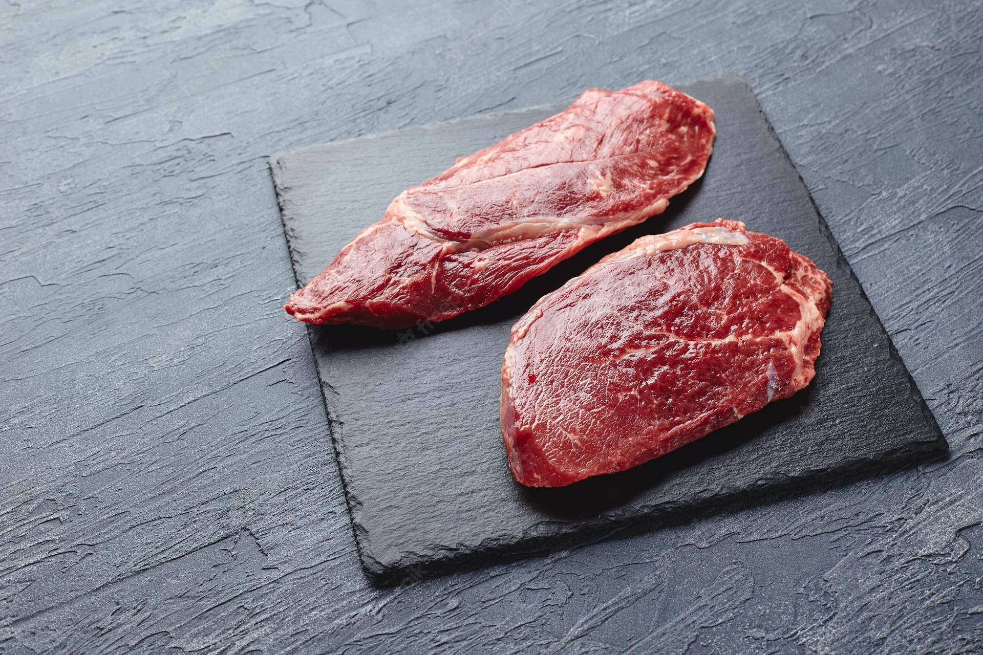 Fresh Kobe Beef On Dark Colored Board Background