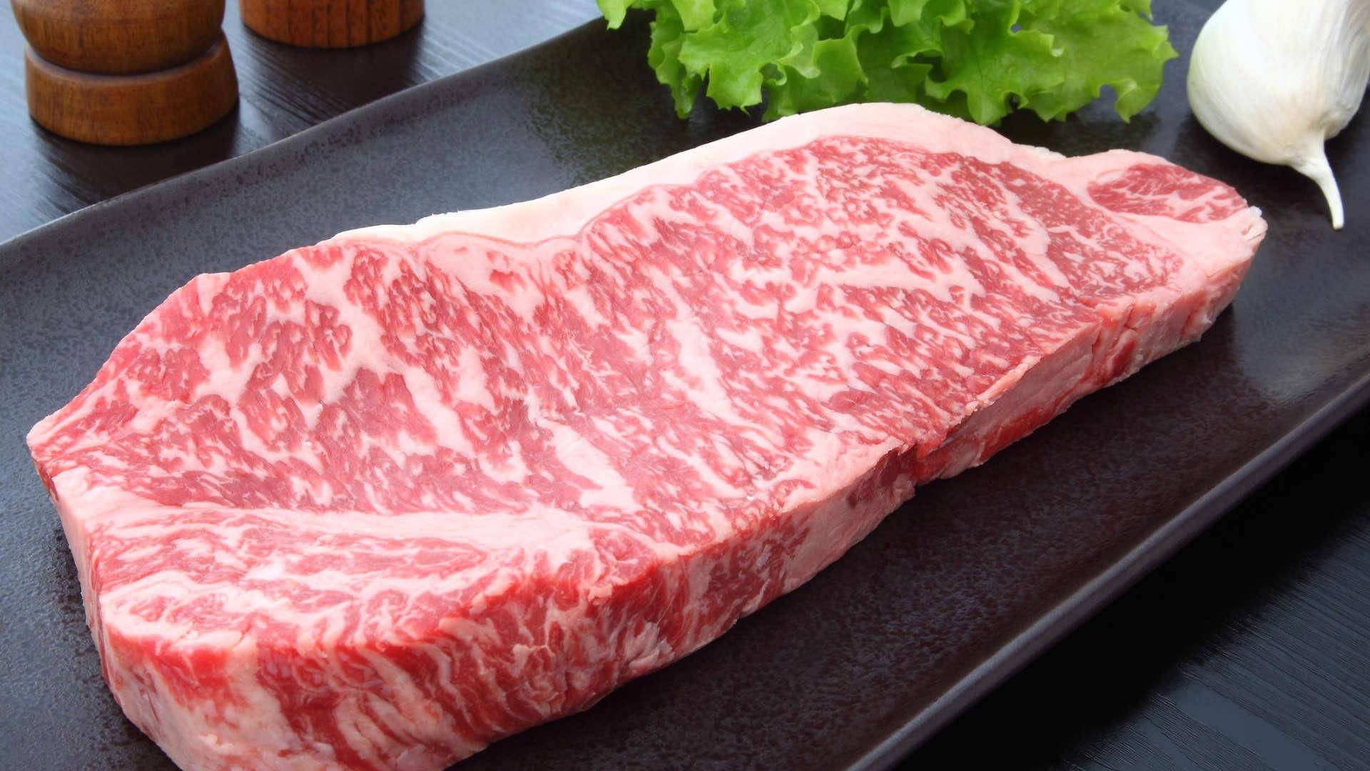 Fresh Kobe Beef On Rectangular Plate Background