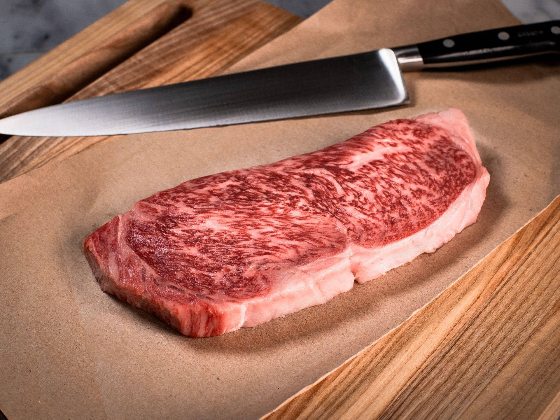 Fresh Kobe Beef Wagyu On Brown Paper Background